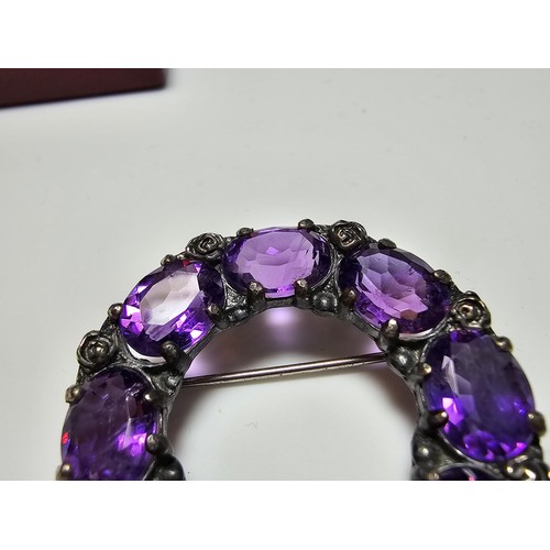 285 - A fine quality 925 silver vintage brooch inset with 8x faceted amethyst gemstones, each stone is of ... 