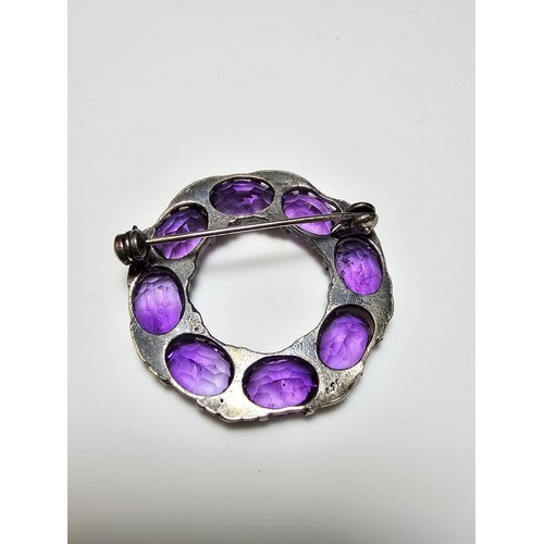 285 - A fine quality 925 silver vintage brooch inset with 8x faceted amethyst gemstones, each stone is of ... 