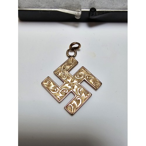 287 - A vintage German 9ct solid gold Swastika pendant with an engraved design, most likely from WWII. Mar... 