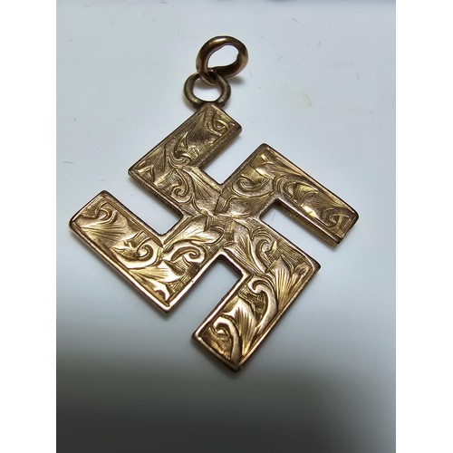 287 - A vintage German 9ct solid gold Swastika pendant with an engraved design, most likely from WWII. Mar... 