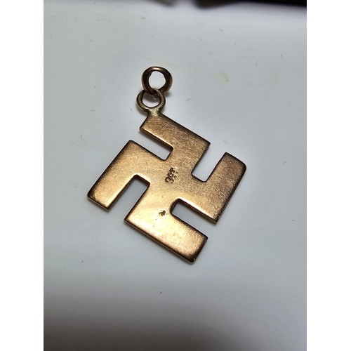 287 - A vintage German 9ct solid gold Swastika pendant with an engraved design, most likely from WWII. Mar... 