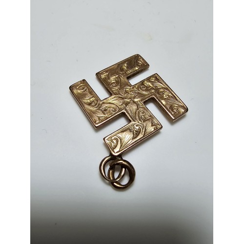 287 - A vintage German 9ct solid gold Swastika pendant with an engraved design, most likely from WWII. Mar... 