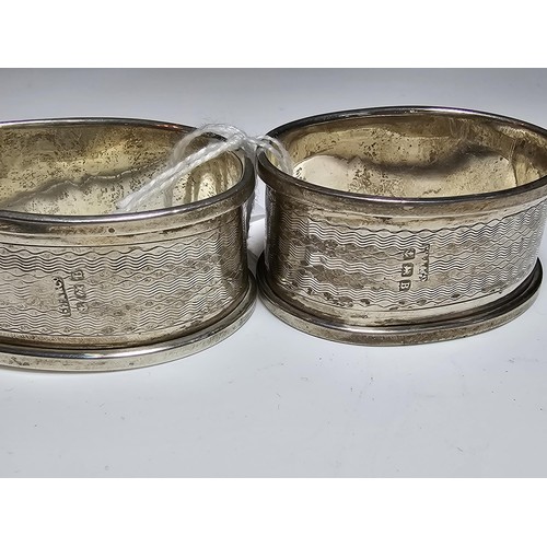 292 - A quantity of hallmarked silver items to include a pair of silver napkin rings, a small salt spoon a... 