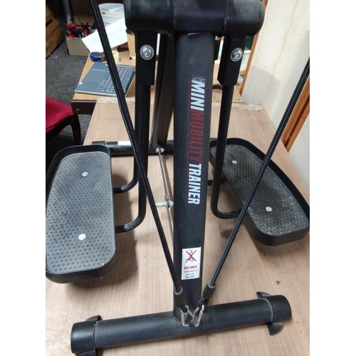 404 - A mini mobility trainer by Ideal Shopping, in working order stands at 105cm high