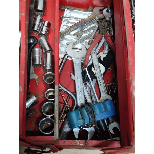 405 - A red metal toolbox containing a larges quantity of spanners along with a socket set (English and me... 