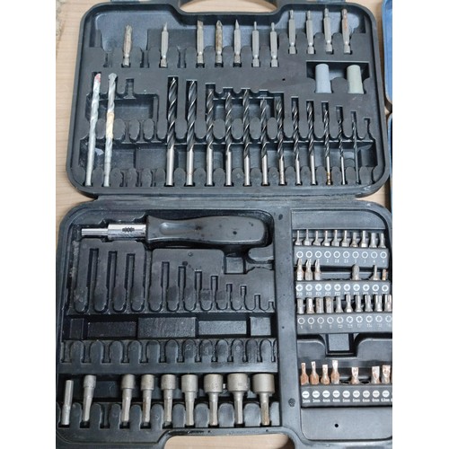 405 - A red metal toolbox containing a larges quantity of spanners along with a socket set (English and me... 