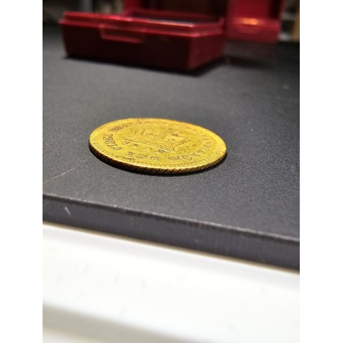 297 - An antique solid gold third guinea coin, George III, dated 1803, in good antique condition. Coin has... 