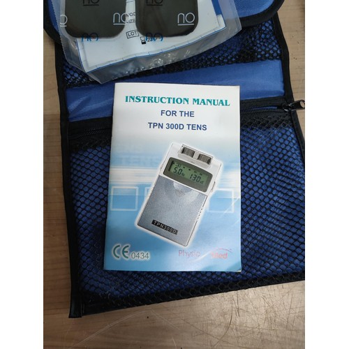 434 - Brand new Tens machine by physio med, complete with 4x pads instructions and leads,