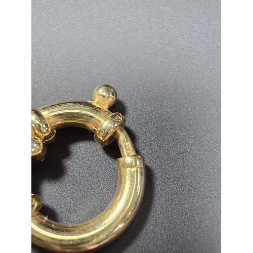 301 - A modern hallmarked 9ct yellow gold bracelet with an unusual multi loop design, in excellent clean c... 