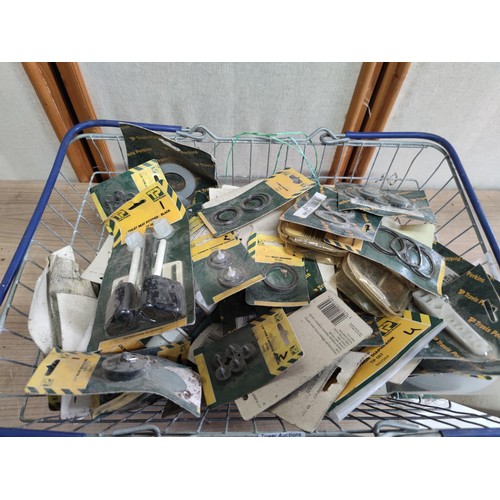 436 - Basket containing a large quantity of sealed accessories from Travis Perkins inc bath plugs, inlet w... 