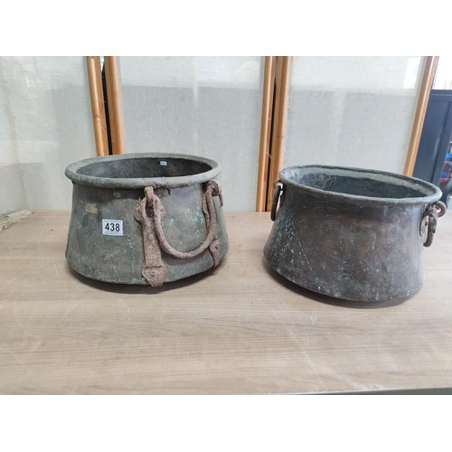 438 - Pair of antique copper pans with wrought iron handles, one pan has holes to the base largest has a h... 