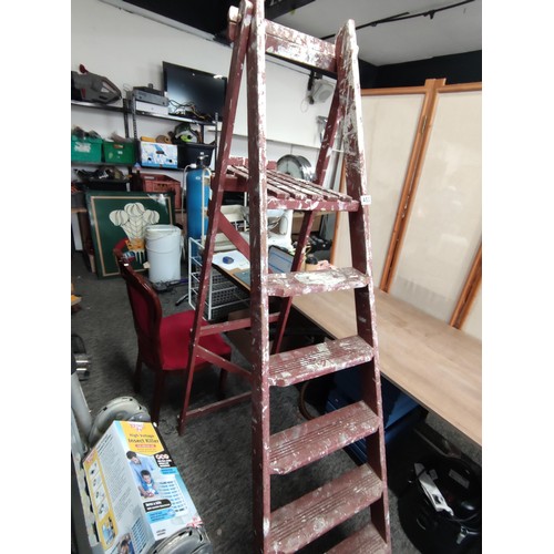 453 - 6ft A frame 6 tier decorators ladder in overall good condition