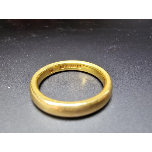 308 - A chunky hallmarked 22ct yellow gold plain wedding band ring in excellent clean condition and boxed.... 