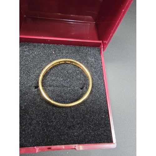 309 - A hallmarked 22ct yellow gold plain wedding band ring in very clean condition and appears to have ha... 