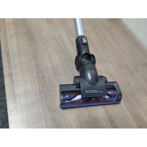 479 - Fully re conditioned Dyson DC34 hand held vacuum cleaner complete with accessories, charger and batt... 