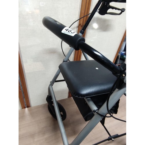 483 - A good quality collapsible wheeled walking aide with a seat, has brakes on the handle bars