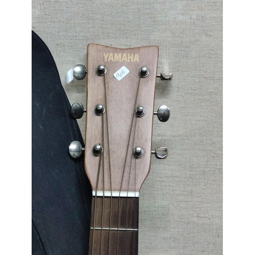 485 - A Yamaha junior guitar along with a Roberts cd player.