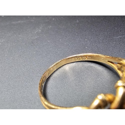 314 - A hallmarked 18ct yellow gold ring with a 3 knot design. In excellent clean condition and boxed ,siz... 