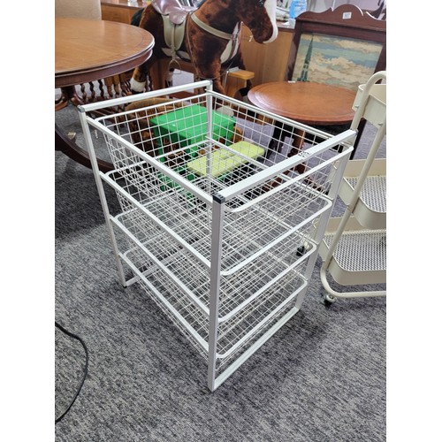 515 - 2 steel kitchen storage racks one of which on castors the largest 70cm high and 54 wide and 42 deep
... 