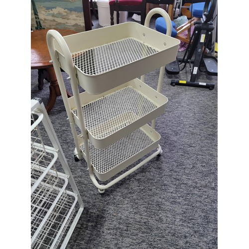 515 - 2 steel kitchen storage racks one of which on castors the largest 70cm high and 54 wide and 42 deep
... 