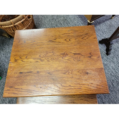 519 - Nest of three oak tables barley twist in good order giving good patina