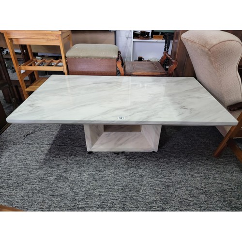 521 - Marble effect topped coffee table the top detaches for transit couple of nibbles.
125cm x 70cm