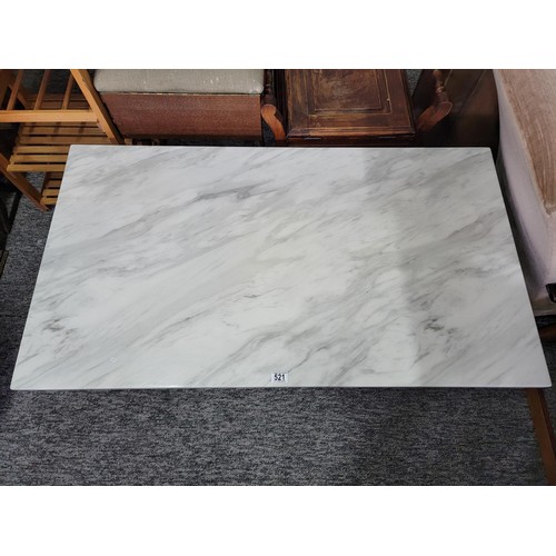 521 - Marble effect topped coffee table the top detaches for transit couple of nibbles.
125cm x 70cm