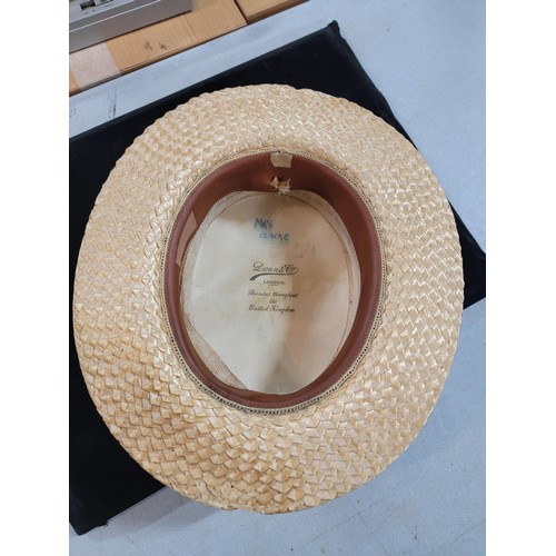 334 - Dunn & Co straw boater hat in original condition
and size 7 1/8