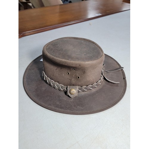 497 - Good quality leather hat by Wombat in good overall condition. See photos for more details