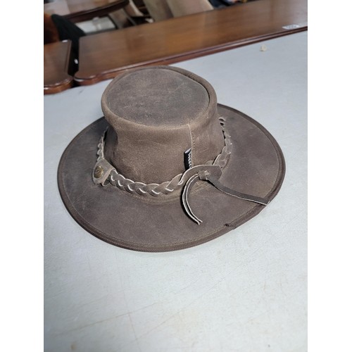 497 - Good quality leather hat by Wombat in good overall condition. See photos for more details