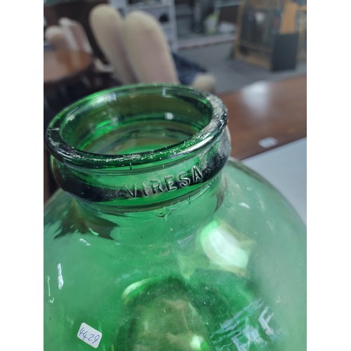 498 - Large Verisa green glass Carbuoy in good overall condition