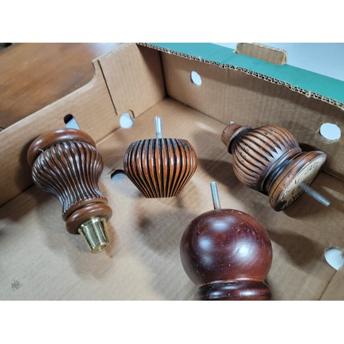 Quantity of wooden furniture feet in different designs to include 5x