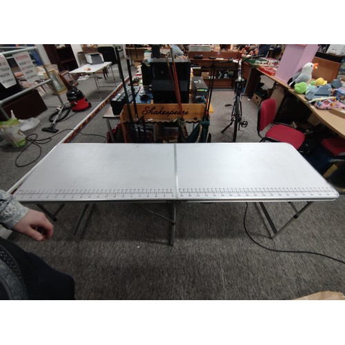 94 - Large white collapsible table with measurements marked on one side possibly as a seamstress table, f... 