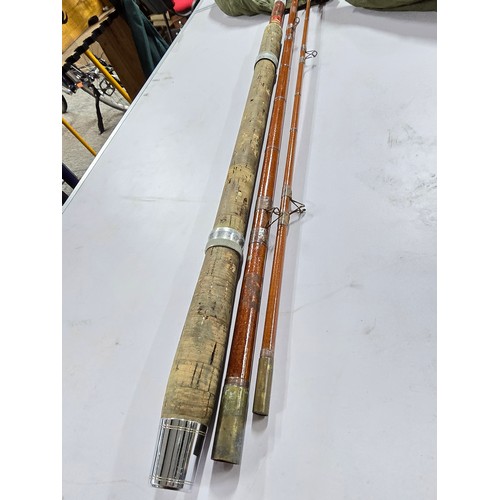 69 - A vintage mordex paramount K, 12ft hollow fibreglass 3 section fishing rod complete with sleeve, in ... 