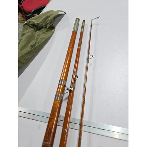 69 - A vintage mordex paramount K, 12ft hollow fibreglass 3 section fishing rod complete with sleeve, in ... 