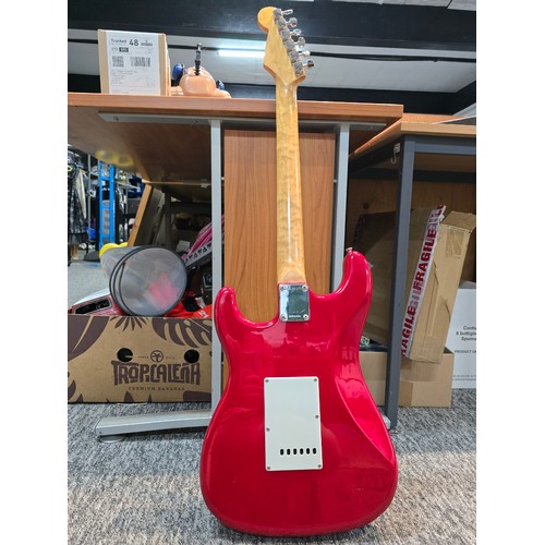 34A - A good quality vintage Sunn Mustang by Fender electric guitar in candy apple red featuring a solid b... 