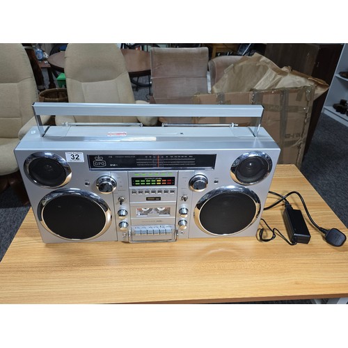 11 - A large impressive re-production portable battery powered boombox by GPO, complete with radio, tape,... 