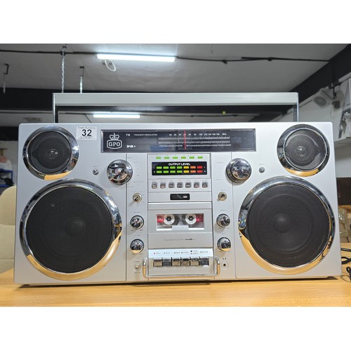 11 - A large impressive re-production portable battery powered boombox by GPO, complete with radio, tape,... 