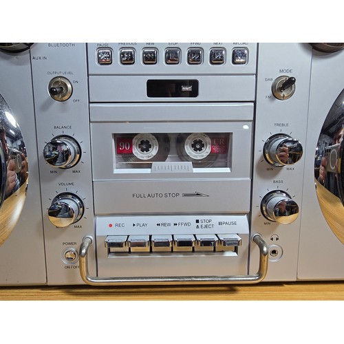 11 - A large impressive re-production portable battery powered boombox by GPO, complete with radio, tape,... 