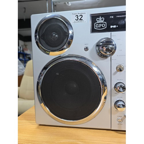 11 - A large impressive re-production portable battery powered boombox by GPO, complete with radio, tape,... 