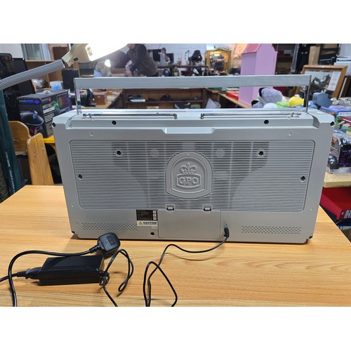 11 - A large impressive re-production portable battery powered boombox by GPO, complete with radio, tape,... 