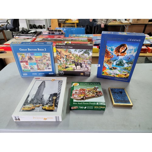 77 - A collection of 5x jigsaw puzzles, 3 are 1000 piece of various subjects, along with a The City Frans... 