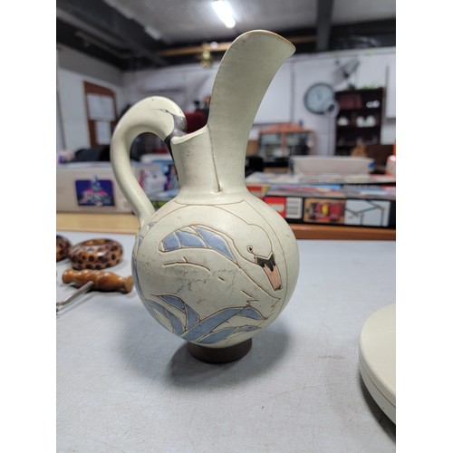 79 - A small quantity of collectables including a studio pottery swan formed jug, vintage corkscrews, can... 