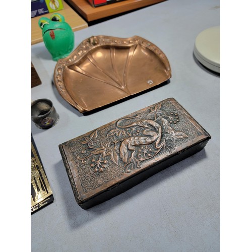 80 - A box of collectables to include an art deco copper tray, a small quantity of threepence coins, mini... 