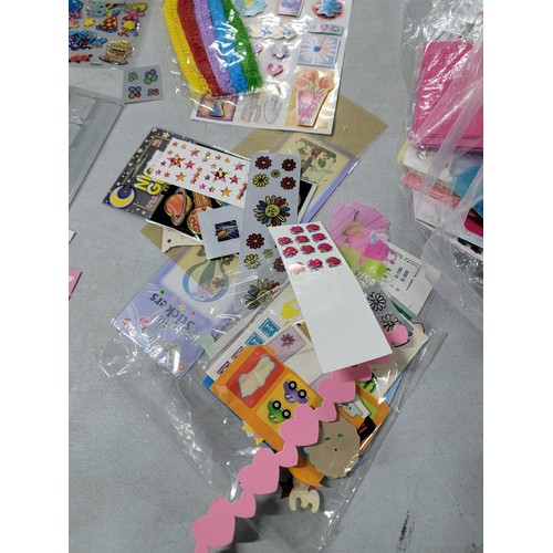 84 - A large collection of craft items mostly containing various sticker sets.