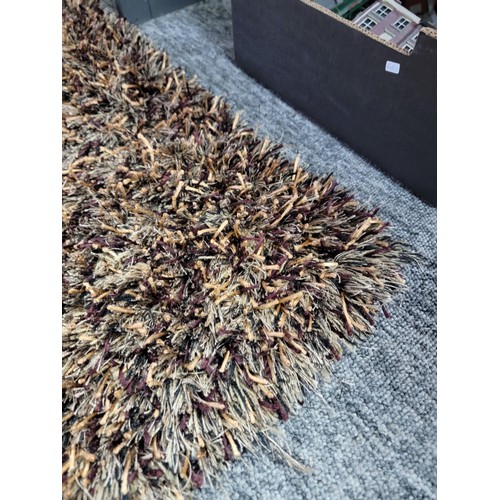 89 - A good quality Indian brown espeda thick pile rug in excellent condition and from a pet free and smo... 