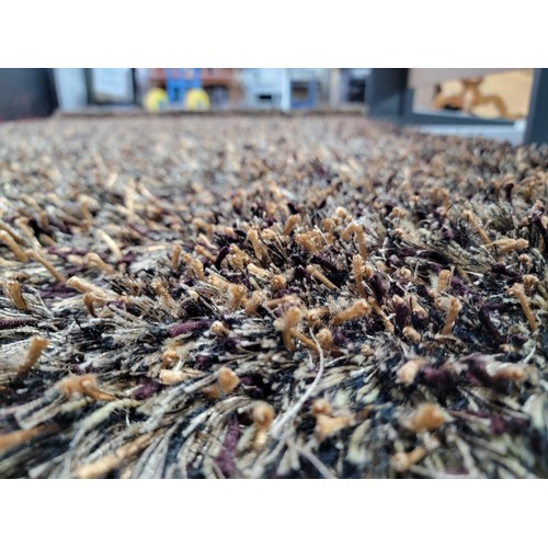 89 - A good quality Indian brown espeda thick pile rug in excellent condition and from a pet free and smo... 