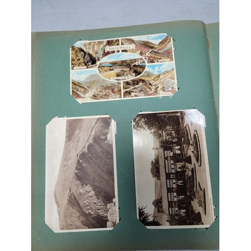 120 - Large very comprehensive album containing various 300 north wales Antique postcards in colour and bl... 