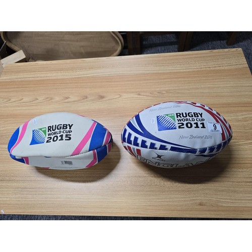 9 - 2 full size Rugby balls relating to the rugby world cup, one is for the world cup 2011 New Zealand (... 