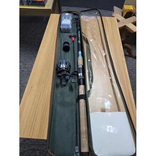 10 - A cased Ledger/feeder fishing rod set 300-5 complete with reel, tackle, hooks, etc. Had very little ... 